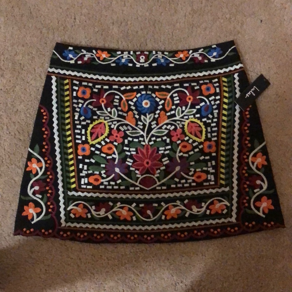 Embroidered black cotton twill skirt. Work or going out. 97% cotton 3% spandex.